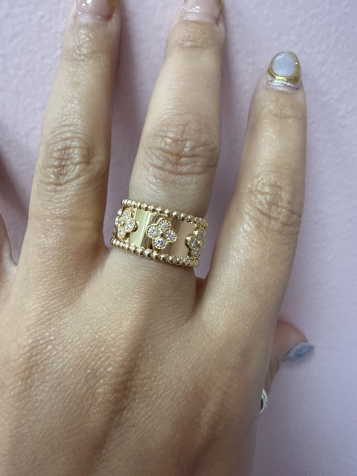 Brilliant-cut diamond solitaire ring on a dark surface