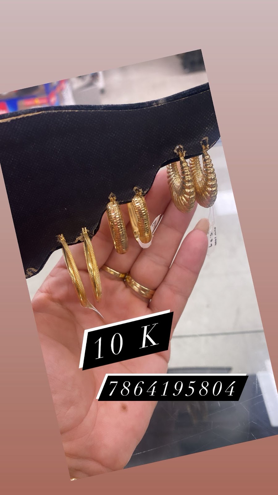A pair of gold and diamond stud earrings