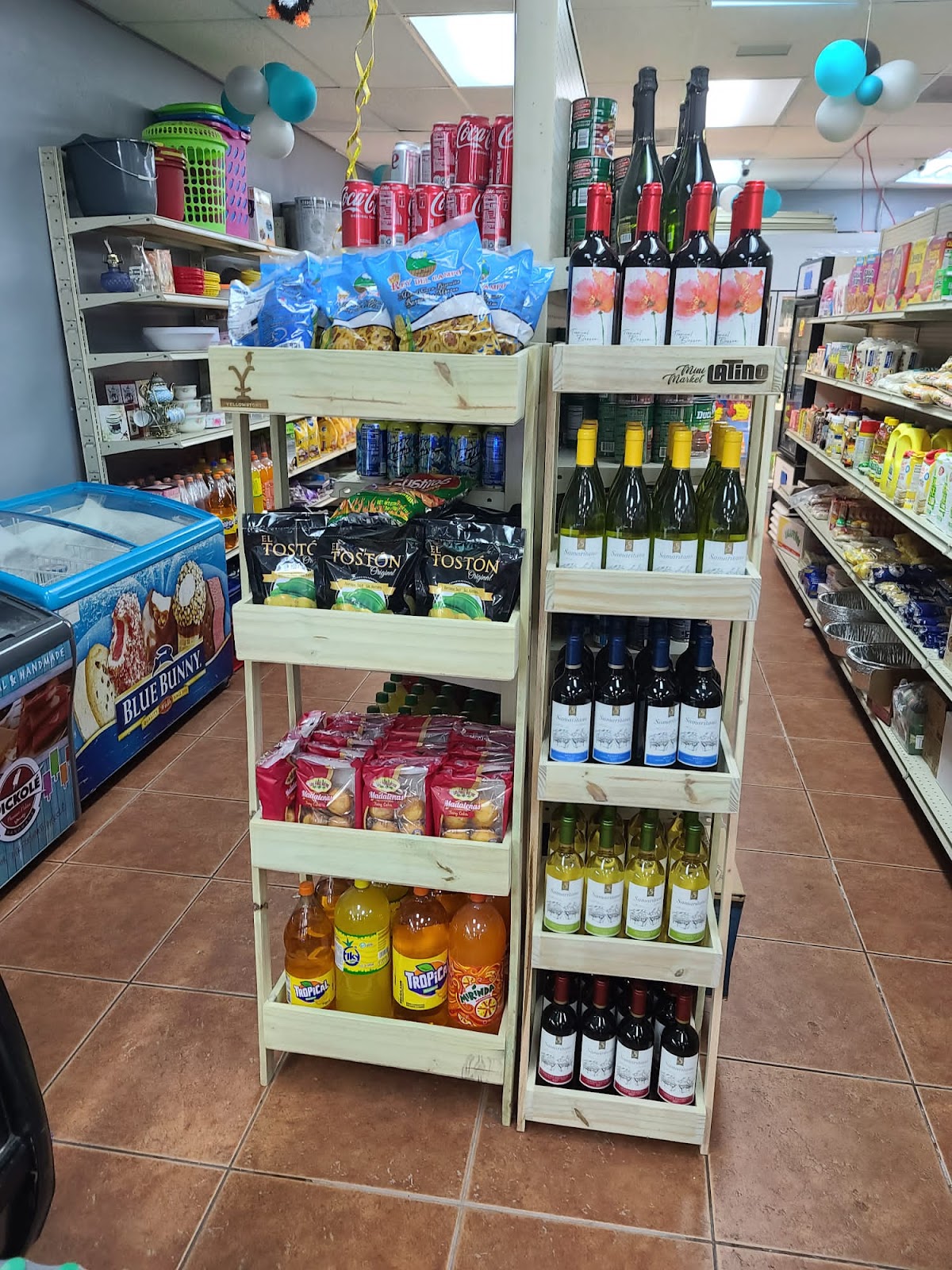 Warm candlelit corner of the Mini Market Latino dining room